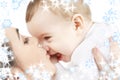 Happy mother kissing baby boy Royalty Free Stock Photo