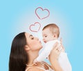 Happy mother kissing her child Royalty Free Stock Photo