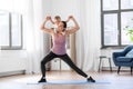 Happy mother with little baby exercising at home Royalty Free Stock Photo