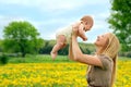 Happy Mother and Newborn Baby Girl Playing Outside Royalty Free Stock Photo