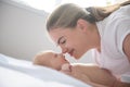 Happy mother playing with her baby girl at home Royalty Free Stock Photo