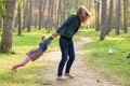 Happy mother playing with his daughter in the park  in summer day Royalty Free Stock Photo