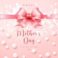 Happy mother`s cute pink ribbon with shining bokeh background and elegant pearls