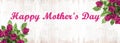 Happy Mother`s day background panorama banner - Bunch bouquet of pink roses and hearts on rustic vintage white bright wooden