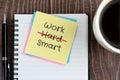 Work smart not hard text on adhesive note