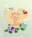 Happy Mother's Day card. Heart is made of old paper with daisy a