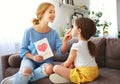 Happy mother`s day! Child daughter congratulates moms Royalty Free Stock Photo