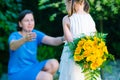 Happy mother`s day! Child girl congratulates mom and gives her b Royalty Free Stock Photo