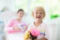 Happy mothers day. Child with present for mom Royalty Free Stock Photo