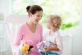 Happy mothers day. Child with present for mom Royalty Free Stock Photo