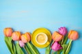 Happy Mother`s day concept with coffee cup and beautiful tulip flowers on wooden background Royalty Free Stock Photo