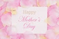 Happy Mother`s Day greeting card on pink rose flower petals Royalty Free Stock Photo