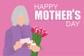 Happy Mother`s day. Old woman holding pink tulips, gift box and greeting card on purple background and text Happy Mothers day. Royalty Free Stock Photo