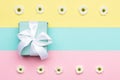 Happy Mother`s Day, Women`s Day, Valentine`s Day or Birthday Pastel Candy Colours Background. Flat lay with a gift box. Royalty Free Stock Photo