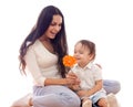 Happy mother and son with flower together isolated Royalty Free Stock Photo