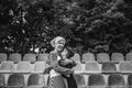 happy mother and son hugging on stadium black Royalty Free Stock Photo