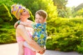 Loving Mother and son playing in summer park Royalty Free Stock Photo