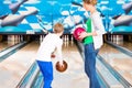 Mother and son playing together at bowling center Royalty Free Stock Photo