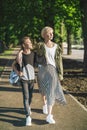 happy mother and son walking together and looking away Royalty Free Stock Photo