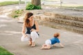 Happy mother playing with baby outside Royalty Free Stock Photo