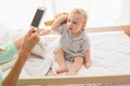 Happy mother taking a picture of her baby boy Royalty Free Stock Photo