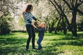 Happy mother and toddler son playing outdoor in spring or summer park Royalty Free Stock Photo