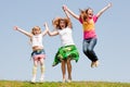 Happy Mother and two daughter jumping Royalty Free Stock Photo