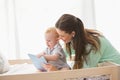 Happy mother using tablet with his baby boy Royalty Free Stock Photo