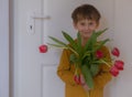 Happy Mother& x27;S Day. Son Gives Flowers For Mom Royalty Free Stock Photo