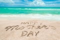 Happy Mothers day beach background with handwritten lettering Royalty Free Stock Photo