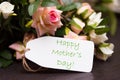 Happy mothers day card with rustic roses on wooden board Royalty Free Stock Photo