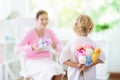 Happy mothers day. Child with present for mom Royalty Free Stock Photo