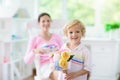 Happy mothers day. Child with present for mom Royalty Free Stock Photo