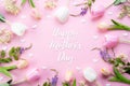 Happy mothers day concept. Top view of pink tulip flowers in frame with happy mother`s day text on pink pastel background. Flat Royalty Free Stock Photo