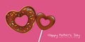 Happy mothers day pink greeting card with heart shaped donut and lollipop Royalty Free Stock Photo