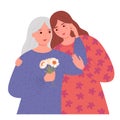 Happy Mothers Day. Senior mother and her adult daughter embrace and look at each other. The concept of holiday greetings