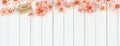 Happy Mothers Day top border with pink paper flowers and gift tag over a white wood banner background Royalty Free Stock Photo