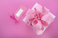 Happy Mothers Day white gift box with pink stripe ribbon. Royalty Free Stock Photo
