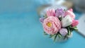 Bouquet of soap flowers on blurred blue background Royalty Free Stock Photo