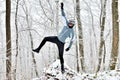 Happy mountain biker in winter