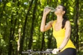 Happy mountain forest cyclist woman outdoors