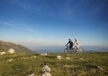 Happy mountainbike couple outdoors have fun together on a summer afternoon Royalty Free Stock Photo