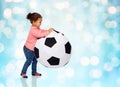 Happy mulatto little baby girl playing with ball Royalty Free Stock Photo