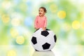 Happy mulatto little baby girl playing with ball Royalty Free Stock Photo