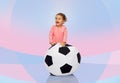 Happy mulatto little baby girl playing with ball Royalty Free Stock Photo