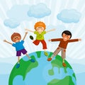 Happy multi ethnic boys standing on the earth. Royalty Free Stock Photo