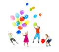 Happy Multi-Ethnic Children Playing Balloons Together Royalty Free Stock Photo