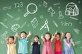 Multi-ethnic group of school children standing in classroom with education concept Royalty Free Stock Photo