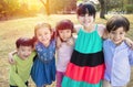 Multi-ethnic group of schoolchildren in park