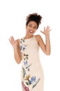 Happy multi-racial woman standing with her hands up, happy Royalty Free Stock Photo